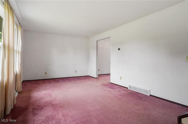 12230 Painesville Warren Rd, Concord, OH 44077 - carpeted empty room with baseboards