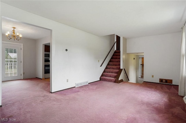 12230 Painesville Warren Rd, Concord, OH 44077 - unfurnished living room with carpet flooring, a chandelier, and stairs