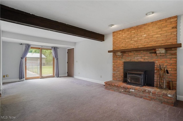12230 Painesville Warren Rd, Concord, OH 44077 - unfurnished living room featuring carpet flooring, beam ceiling, and a wood stove