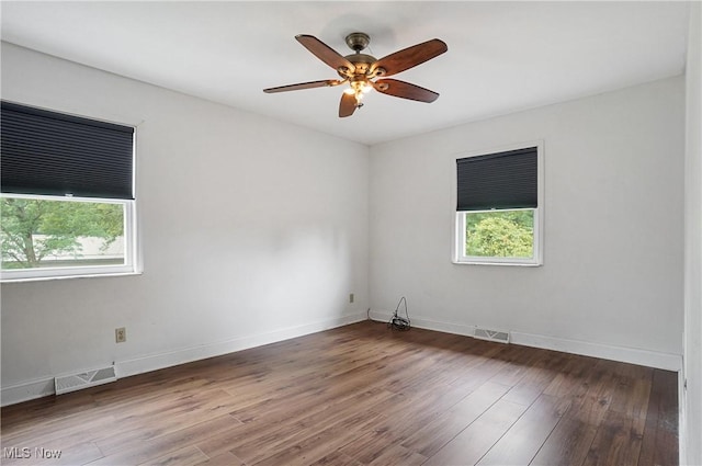 12230 Painesville Warren Rd, Concord, OH 44077 - unfurnished room with wood finished floors and a ceiling fan