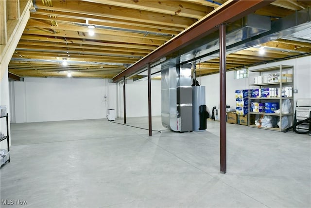 12 Bayview Cir, Cortland, OH 44410 - unfinished basement featuring gas water heater and heating unit