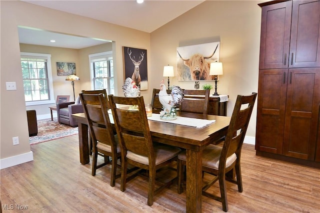 12 Bayview Cir, Cortland, OH 44410 - dining area with light wood-style flooring, vaulted ceiling, and recessed lighting