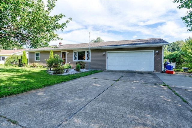 659 Lake Rd, Conneaut, OH 44030 - ranch-style home featuring driveway, a garage, and a front yard