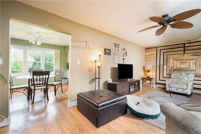 659 Lake Rd, Conneaut, OH 44030 - living area featuring ceiling fan and light wood-style flooring