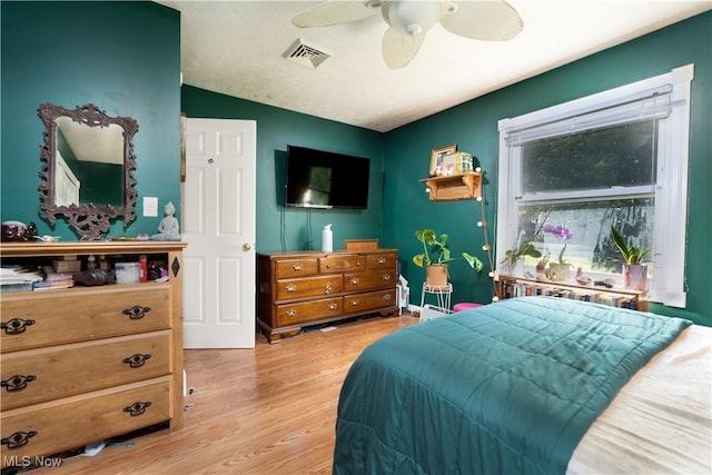 659 Lake Rd, Conneaut, OH 44030 - bedroom featuring light wood-style floors, vaulted ceiling, and ceiling fan