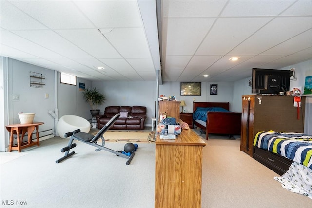 659 Lake Rd, Conneaut, OH 44030 - workout area with carpet flooring, a baseboard heating unit, a paneled ceiling, and recessed lighting