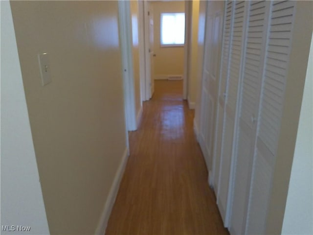 1064 E 168th St, Cleveland, OH 44110 - corridor featuring light wood-style floors and baseboards