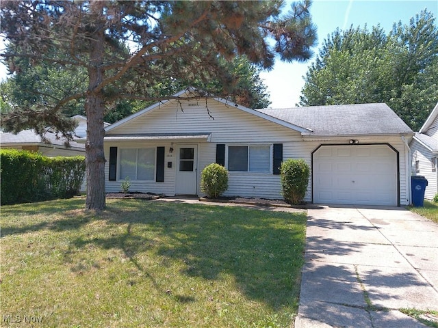 1064 E 168th St, Cleveland, OH 44110 - ranch-style home featuring a garage, driveway, a front yard, and a shingled roof