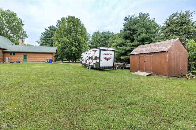 5621 Schustrich Rd, Mantua, OH 44255 - view of grassy yard featuring a storage unit
