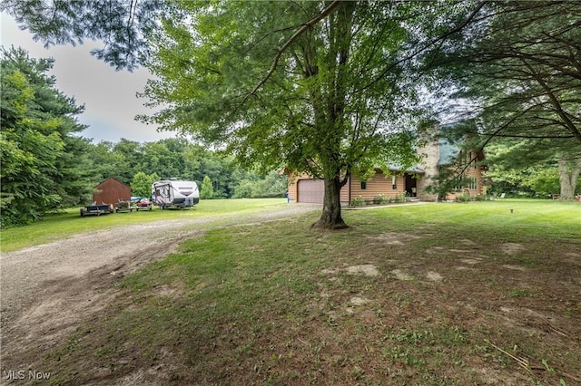 5621 Schustrich Rd, Mantua, OH 44255 - view of grassy yard featuring dirt driveway