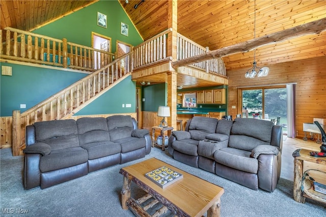 5621 Schustrich Rd, Mantua, OH 44255 - living area featuring carpet flooring, wooden walls, high vaulted ceiling, wood ceiling, and a chandelier