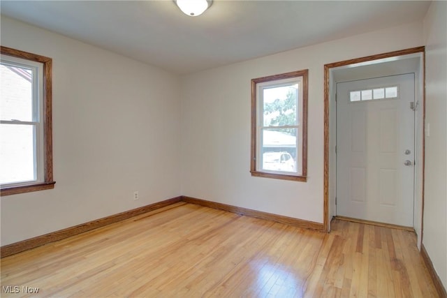 8102 Bertha Ave, Parma, OH 44129 - foyer entrance with light wood finished floors and baseboards
