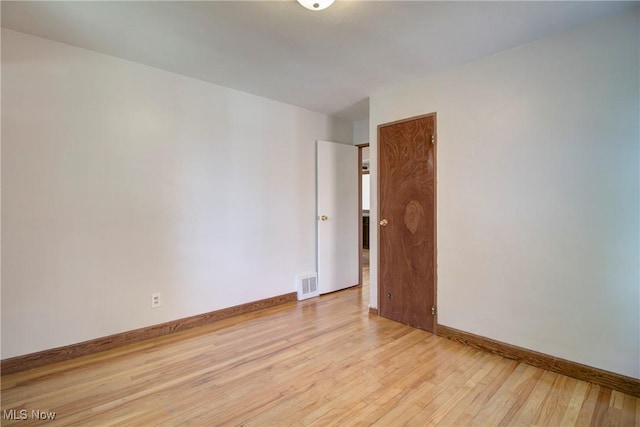 8102 Bertha Ave, Parma, OH 44129 - spare room with light wood finished floors and baseboards