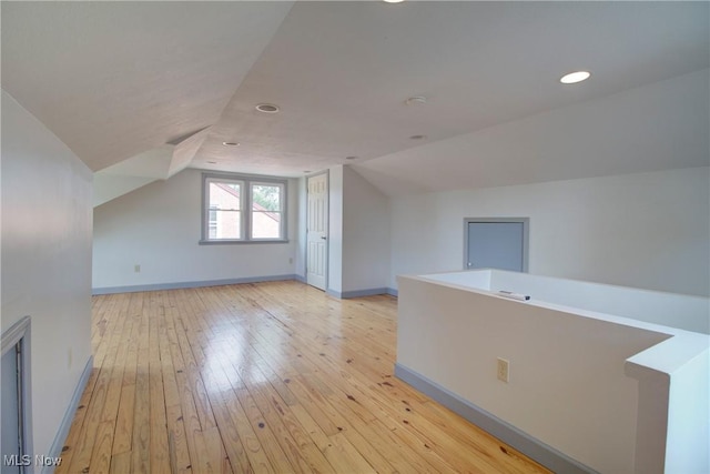 8102 Bertha Ave, Parma, OH 44129 - additional living space featuring lofted ceiling, light wood-style flooring, and recessed lighting