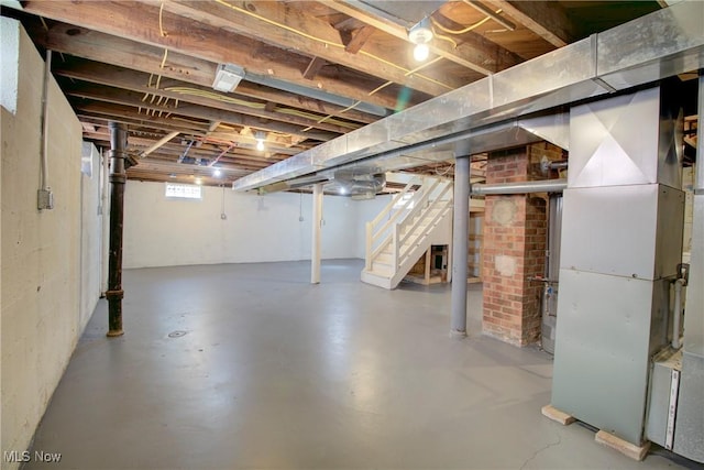 8102 Bertha Ave, Parma, OH 44129 - below grade area with stairway and heating unit