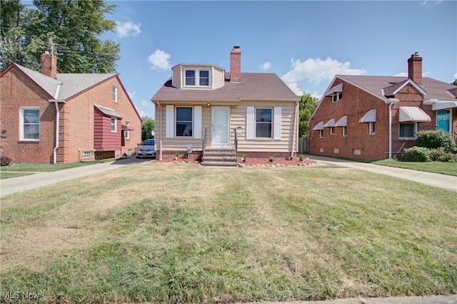 8102 Bertha Ave, Parma, OH 44129 - bungalow with a front lawn and a chimney