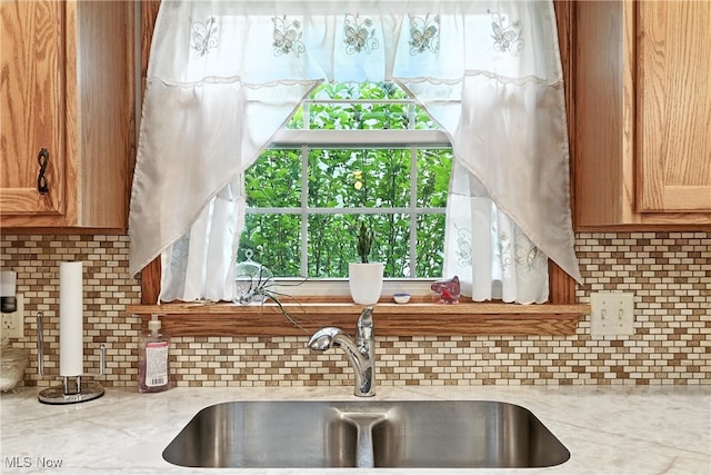 136 Elmridge Rd, Mansfield, OH 44907 - kitchen featuring tasteful backsplash and light stone countertops