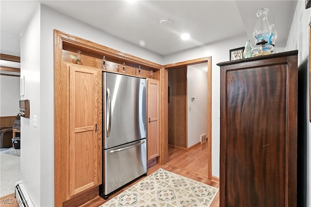 136 Elmridge Rd, Mansfield, OH 44907 - kitchen featuring freestanding refrigerator, a baseboard radiator, light wood finished floors, and recessed lighting