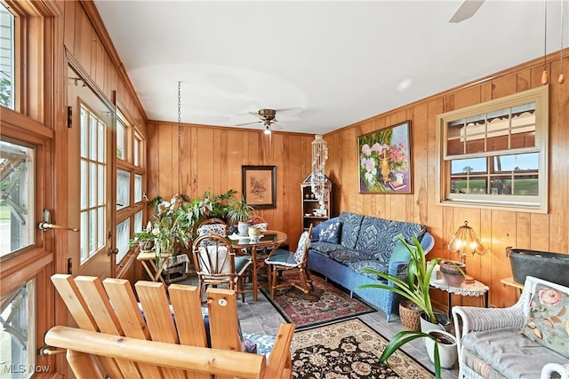 136 Elmridge Rd, Mansfield, OH 44907 - living area with a ceiling fan and wood walls