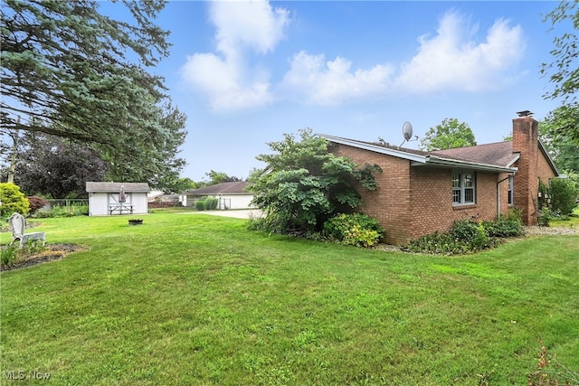 136 Elmridge Rd, Mansfield, OH 44907 - view of yard with a storage unit