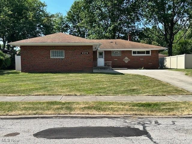 8375 Royal Ridge Dr, Parma, OH 44129 - ranch-style home featuring brick siding and driveway