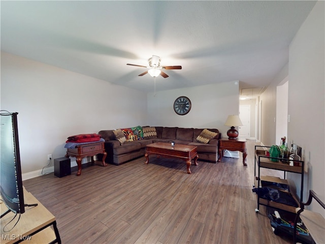 1345 E 359th St, Eastlake, OH 44095 - living room featuring a ceiling fan and wood finished floors