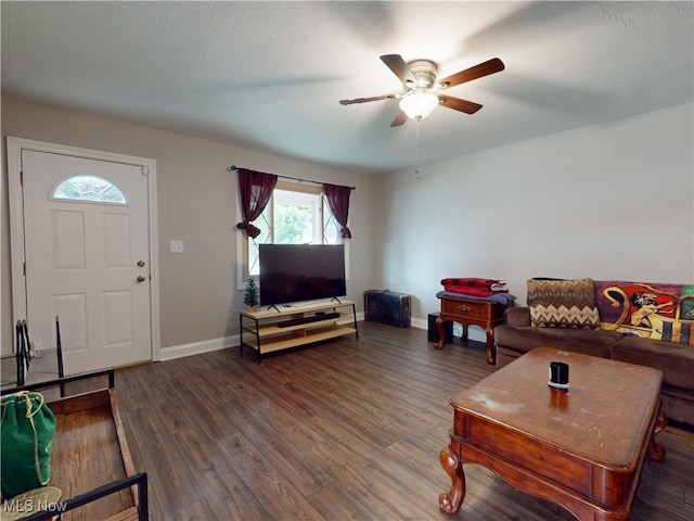 1345 E 359th St, Eastlake, OH 44095 - living area featuring a ceiling fan and wood finished floors