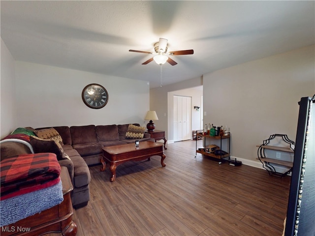 1345 E 359th St, Eastlake, OH 44095 - living room featuring a ceiling fan and wood finished floors