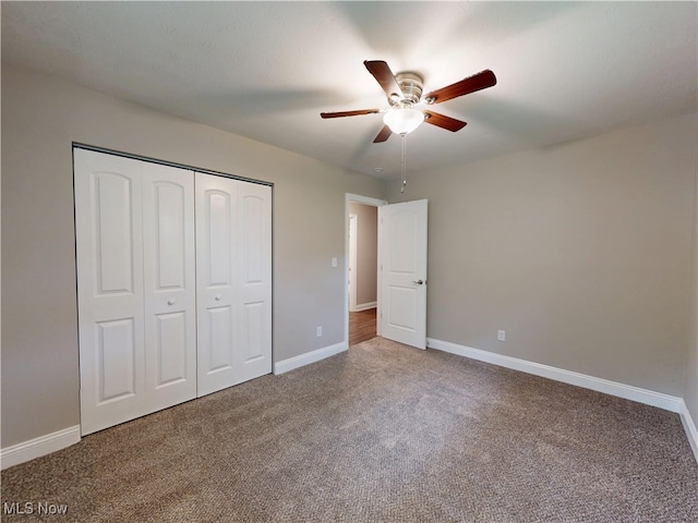 1345 E 359th St, Eastlake, OH 44095 - unfurnished bedroom featuring carpet, a closet, and a ceiling fan