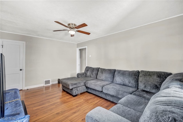 21100 Watson Rd, Maple Heights, OH 44137 - living area with a ceiling fan and wood finished floors