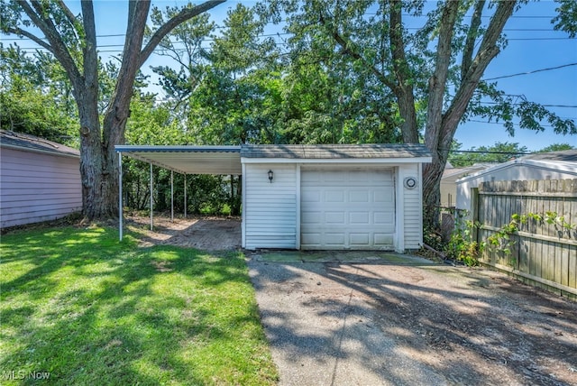 21100 Watson Rd, Maple Heights, OH 44137 - garage with driveway and a detached garage