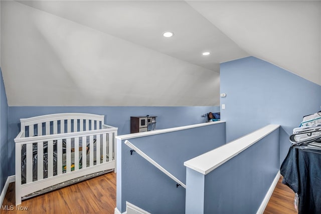21100 Watson Rd, Maple Heights, OH 44137 - bedroom with lofted ceiling, wood finished floors, and recessed lighting