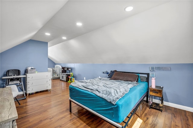 21100 Watson Rd, Maple Heights, OH 44137 - bedroom with vaulted ceiling, wood finished floors, and recessed lighting