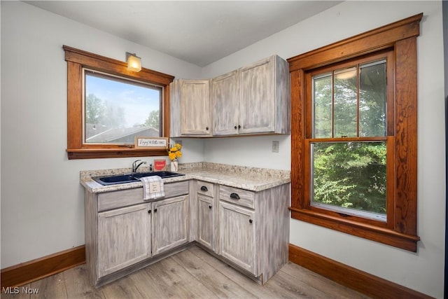 1029 S Main St, Grafton, OH 44044 - kitchen with light countertops and light wood-style floors