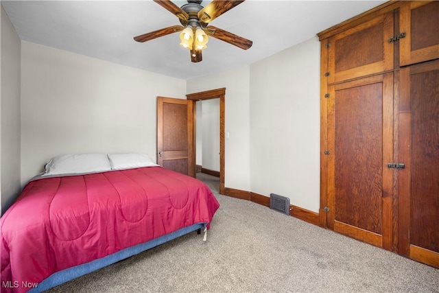 1029 S Main St, Grafton, OH 44044 - bedroom with carpet floors and a ceiling fan