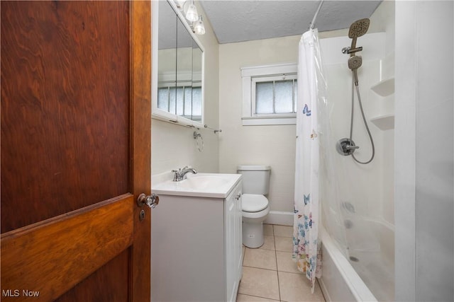 1029 S Main St, Grafton, OH 44044 - full bath featuring vanity, tile patterned floors, and shower / bath combo with shower curtain