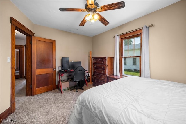 1029 S Main St, Grafton, OH 44044 - carpeted bedroom featuring an office area and ceiling fan