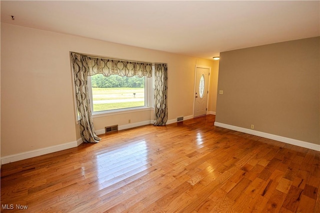 9306 Beech St, Louisville, OH 44641 - spare room featuring light wood finished floors