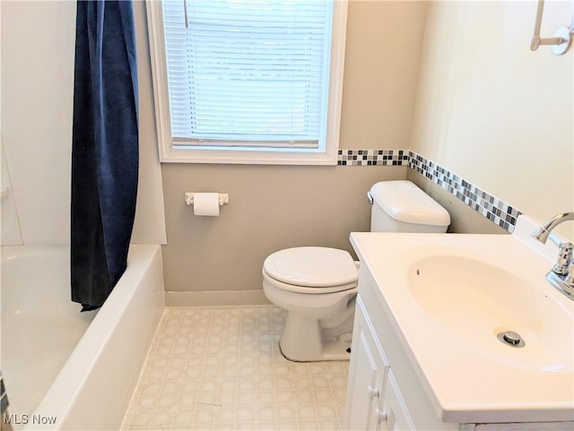 9306 Beech St, Louisville, OH 44641 - bathroom featuring vanity, tile patterned floors, and shower / bath combination with curtain
