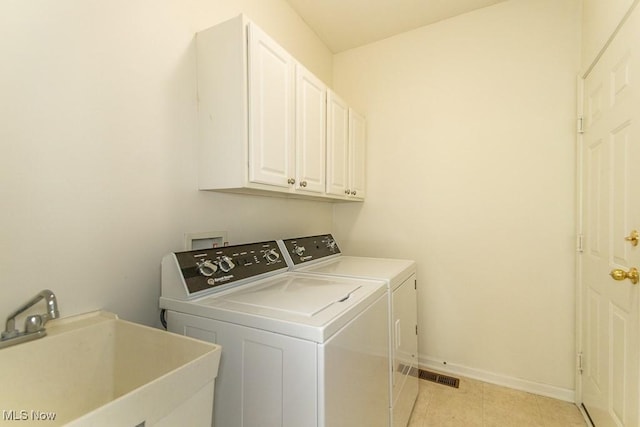 583 Mock Orange Cir, Chagrin Falls, OH 44023 - laundry room featuring washer and dryer and cabinet space