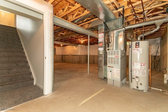 583 Mock Orange Cir, Chagrin Falls, OH 44023 - unfinished below grade area featuring water heater, stairway, and heating unit