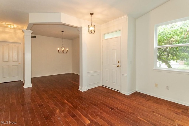 583 Mock Orange Cir, Chagrin Falls, OH 44023 - foyer with a chandelier, dark wood-type flooring, and healthy amount of natural light