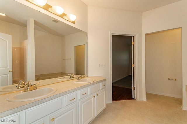 583 Mock Orange Cir, Chagrin Falls, OH 44023 - bathroom featuring double vanity and tile patterned flooring