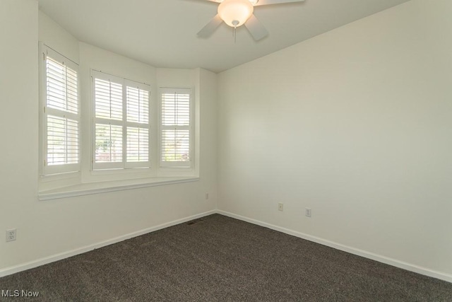 583 Mock Orange Cir, Chagrin Falls, OH 44023 - spare room featuring dark colored carpet and a ceiling fan