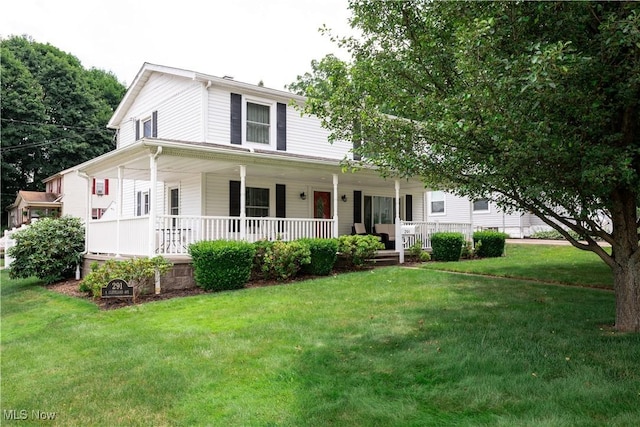 291 S Cleveland Ave, Mogadore, OH 44260 - view of front of property featuring a porch and a front lawn