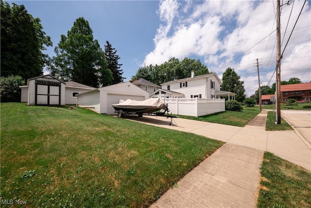 291 S Cleveland Ave, Mogadore, OH 44260 - view of yard with a storage shed and a garage