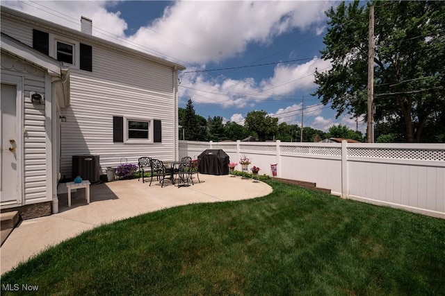 291 S Cleveland Ave, Mogadore, OH 44260 - fenced backyard featuring a patio