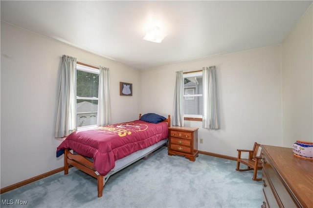 291 S Cleveland Ave, Mogadore, OH 44260 - bedroom with multiple windows and carpet flooring