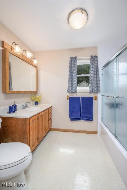291 S Cleveland Ave, Mogadore, OH 44260 - full bath with vanity and combined bath / shower with glass door