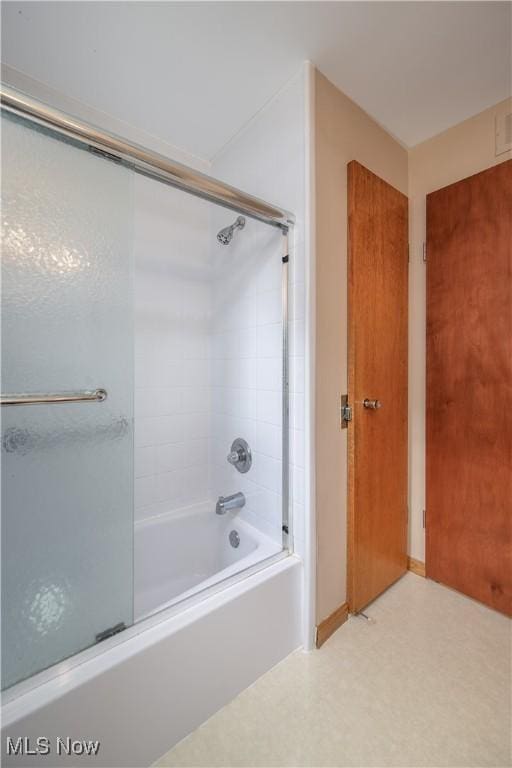 291 S Cleveland Ave, Mogadore, OH 44260 - full bathroom featuring combined bath / shower with glass door and tile patterned floors